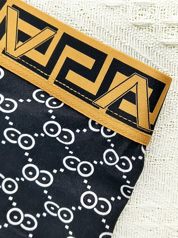 4-teiliges Herren-Boxershorts-Set aus Polyester – luxuriöse, mehrfarbige Unterwäsche mit geometrischem und Monogrammmuster
