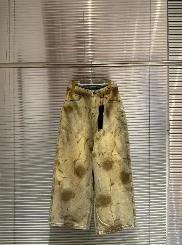 Latui Atelier Υψηλής ποιότητας Κεντημένο τζιν παντελόνι ROSE με λεκέδες και φθορές και τζιν με σχέδιο Flared Leg